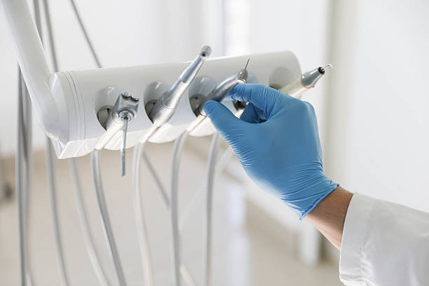 Professional Tooth Extraction technician working in Coeur d'Alene, ID